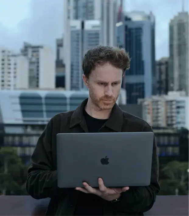 Team member reviewing the platform on a phone at night